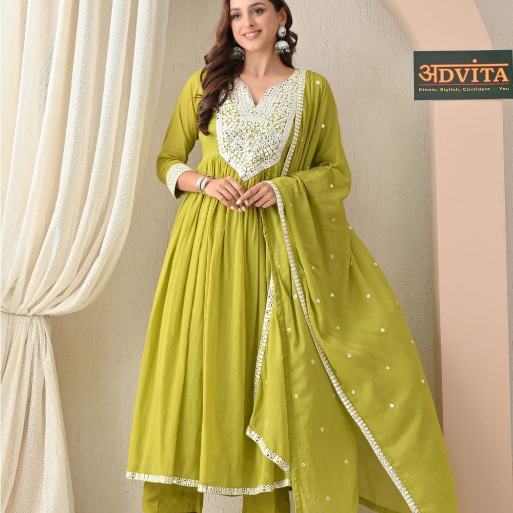 Green outfit with foil mirror work on white embroidery Nyra cut Suit